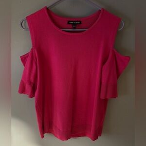 Women’s size medium cold-shoulder cut out sweater.